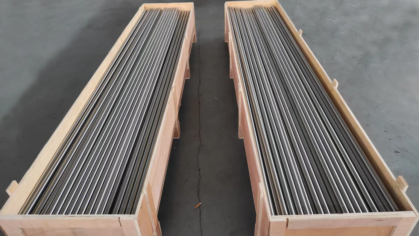 Titanium bars resting in a wooden cradle