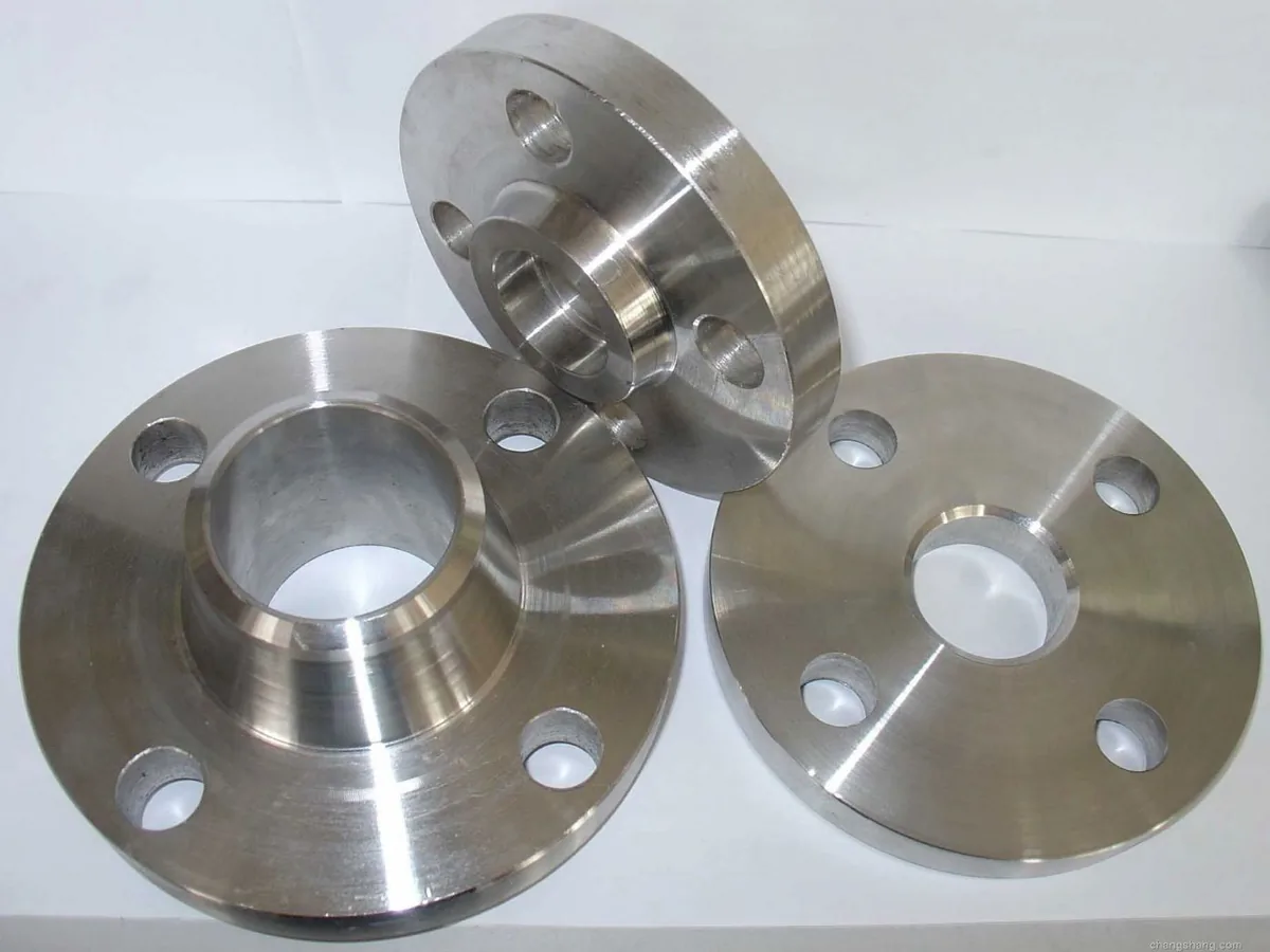Titanium flanges and a blind disc on a bench