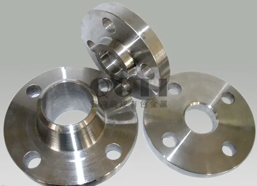 Titanium flange lying on a surface