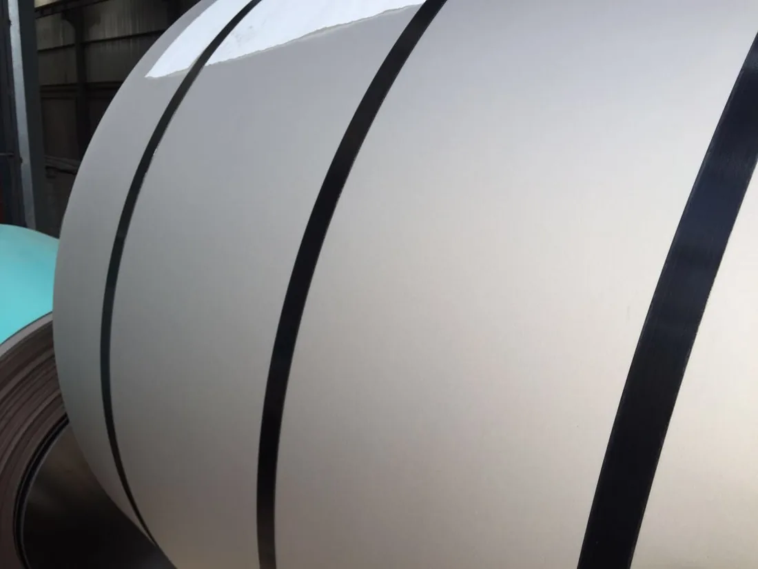 Titanium strip being uncoiled at a measuring station