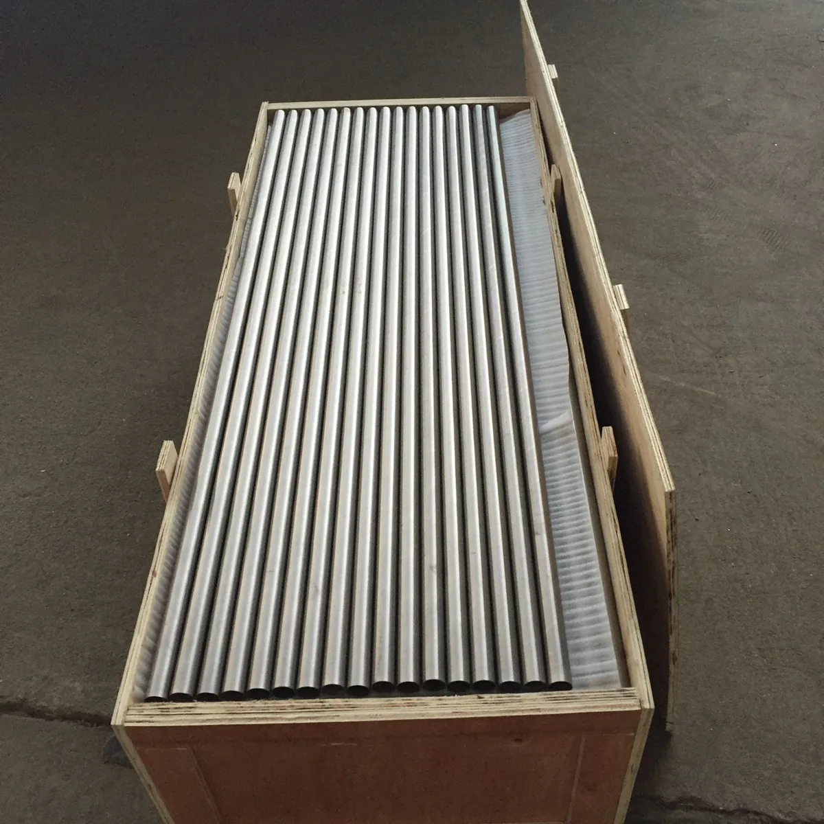 Titanium tube bundle on a timber pallet